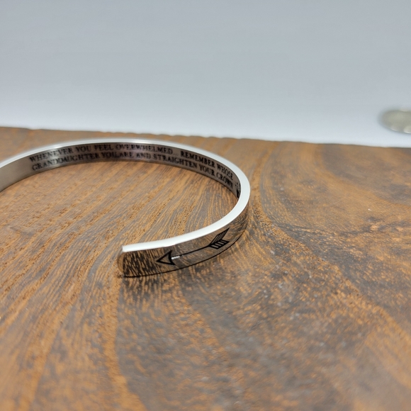 Silver Colored Bracelet With Arrows On The Outside And A Saying On the Inside - Picture 4 of 4